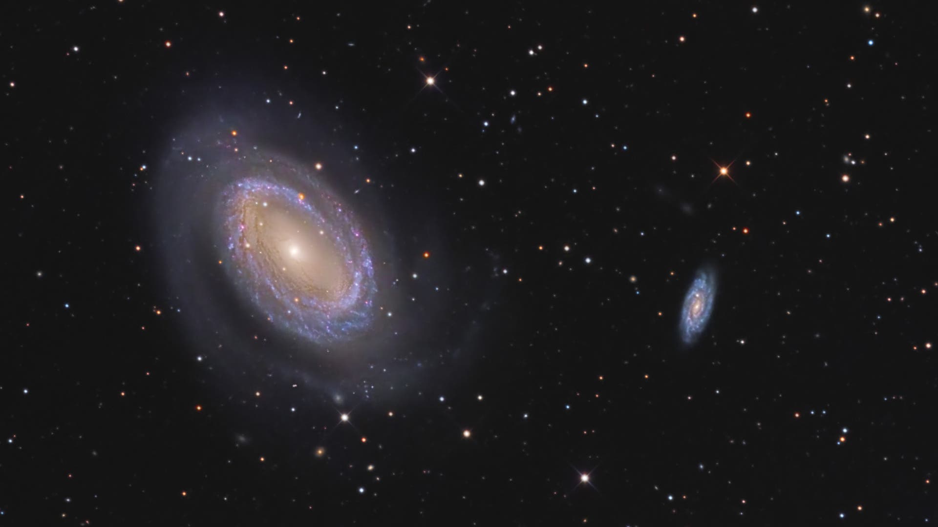 NGC 4725 / NGC 4712 Spektrum der Wissenschaft