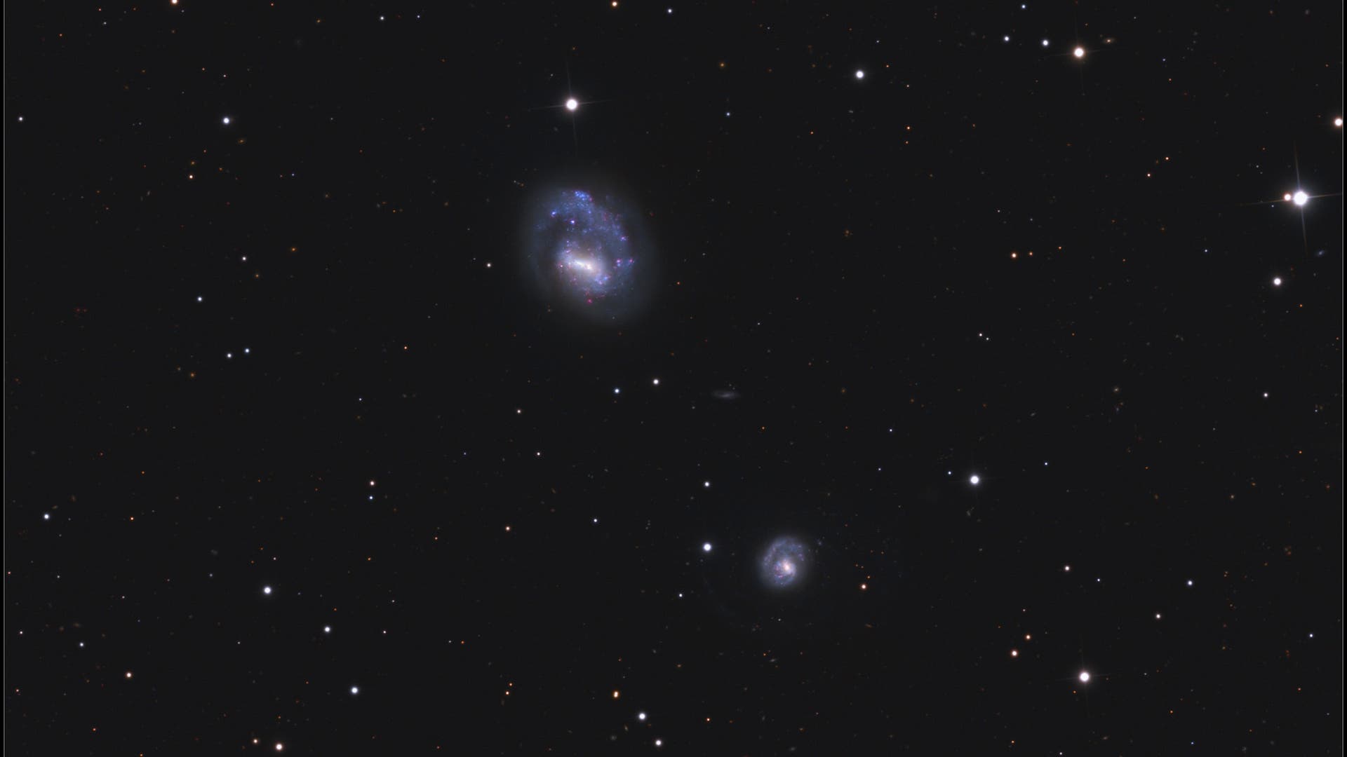 Arp 23 NGC 4618 & 4625 Spektrum der Wissenschaft