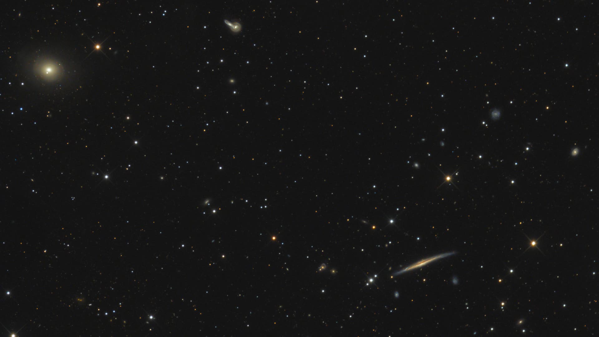 NGC 5529 und NGC 5557 Spektrum der Wissenschaft