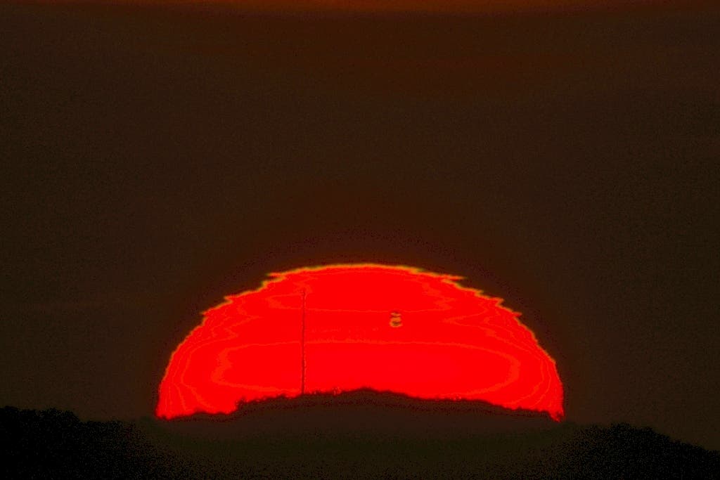 Dreifache Venussilhouette bei Sonnenaufgang