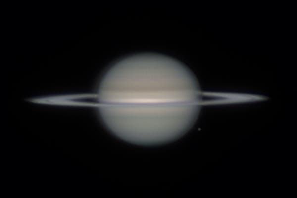 Saturn mit Mond Rhea