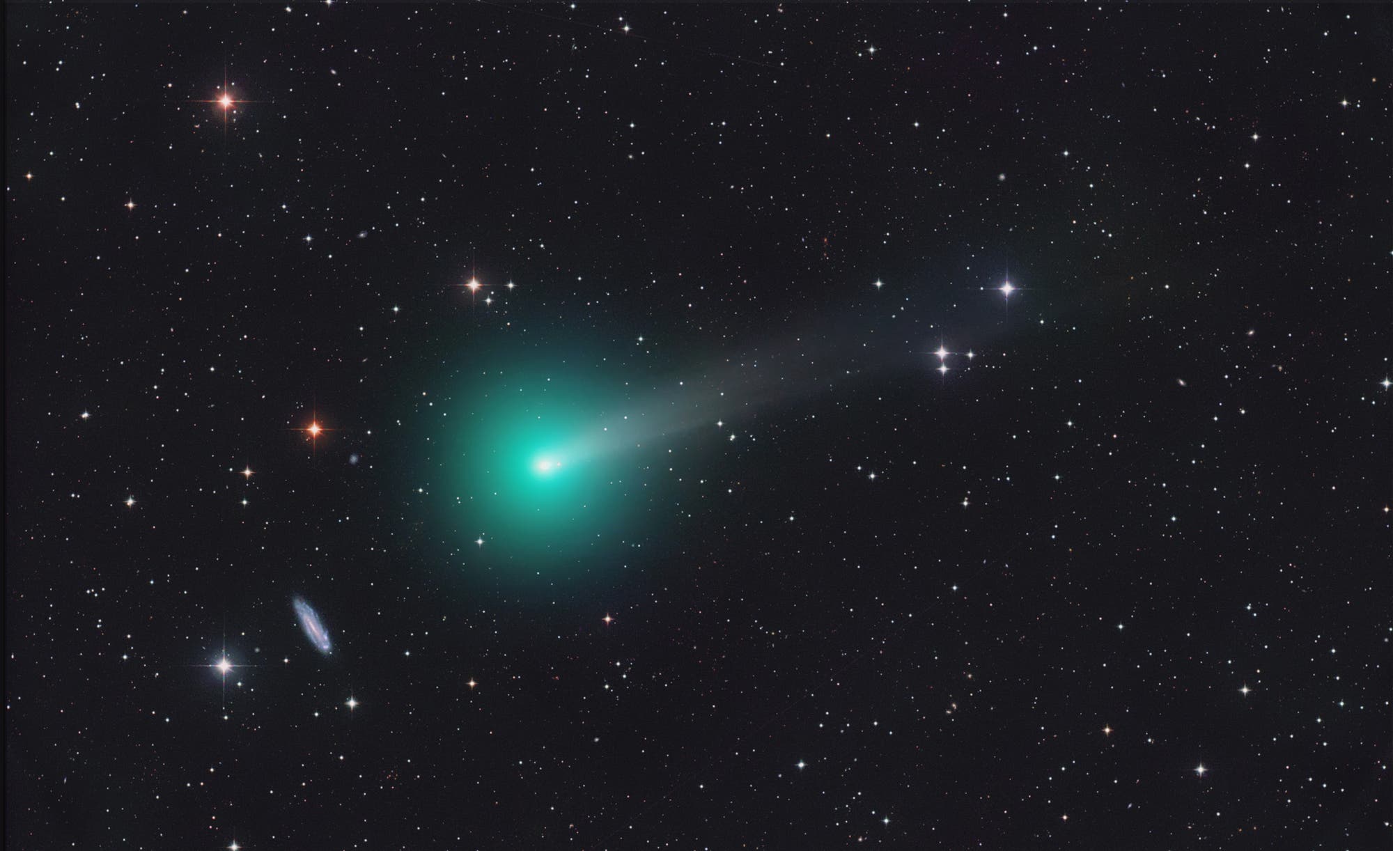 Komet bei Balkenspirale