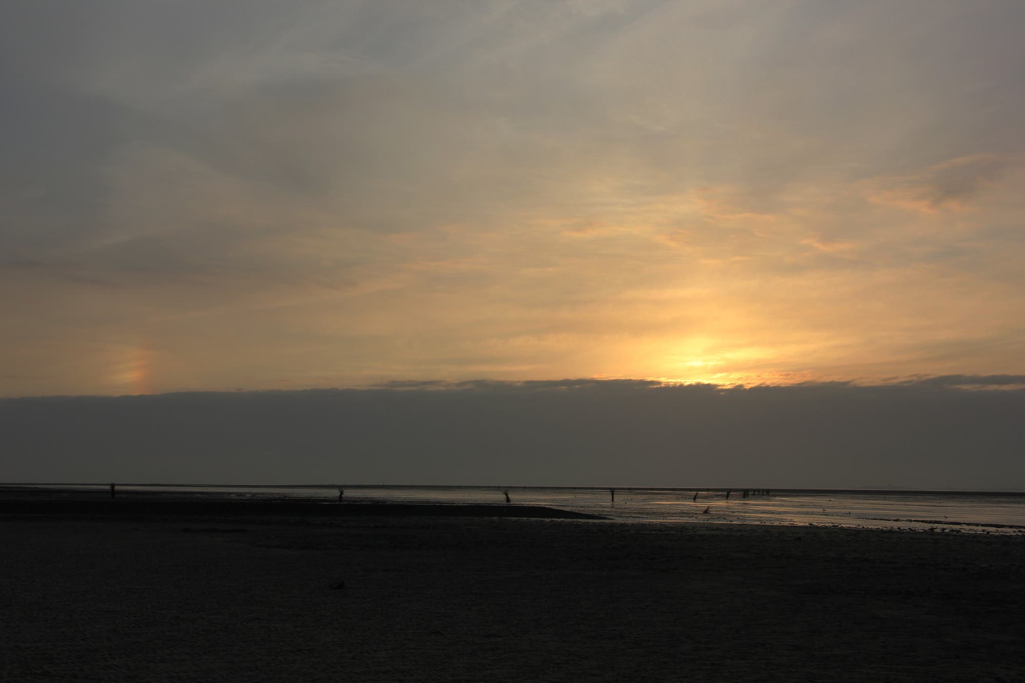 Nebensonne über dem Wattenmeer bei Cuxhaven