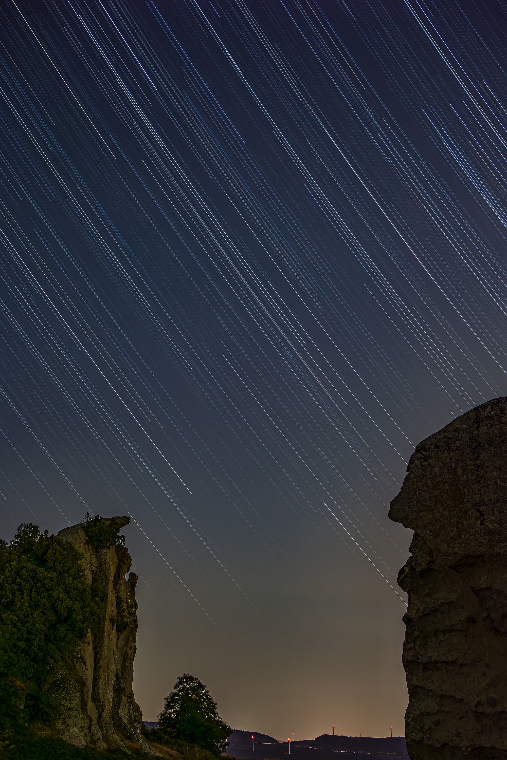 Star trails at the rock of the Prayer at the Argimusco plateau