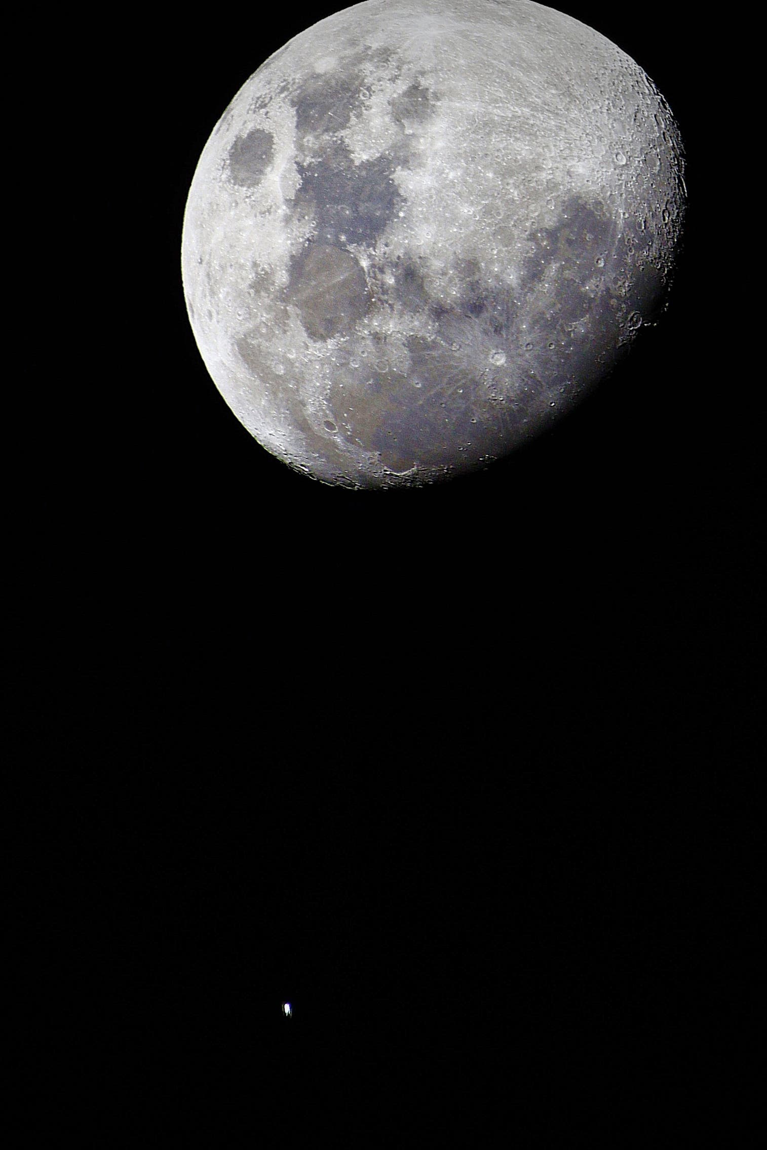 The International Space Station near the Moon, Italy, Sicily. Ragusa 