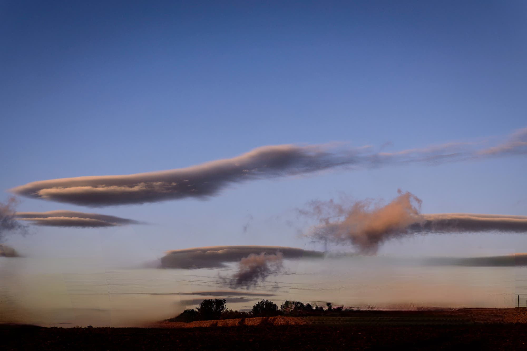 Lenticular clouds over Ragusa Italy Sicily 