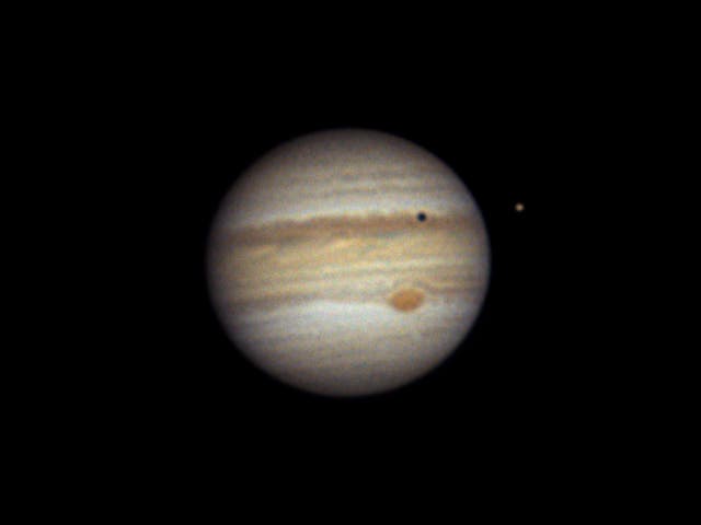 Jupiter mit Mond Io und Schattenwurf