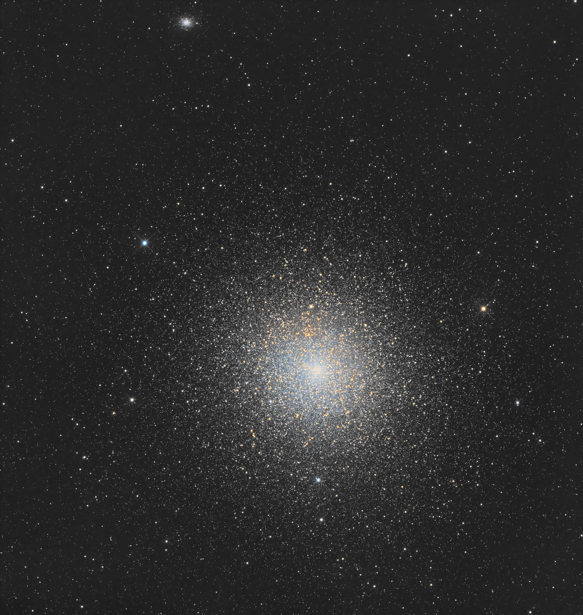 Der Riese und der Zwerg - Tuc 47 und NGC 121