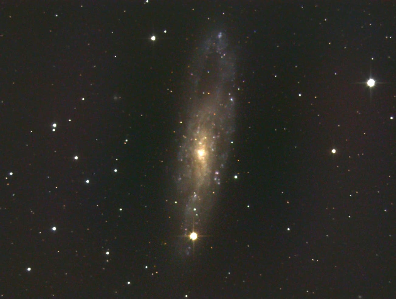 NGC 247 - eine leuchtschwache Galaxie im Walfisch