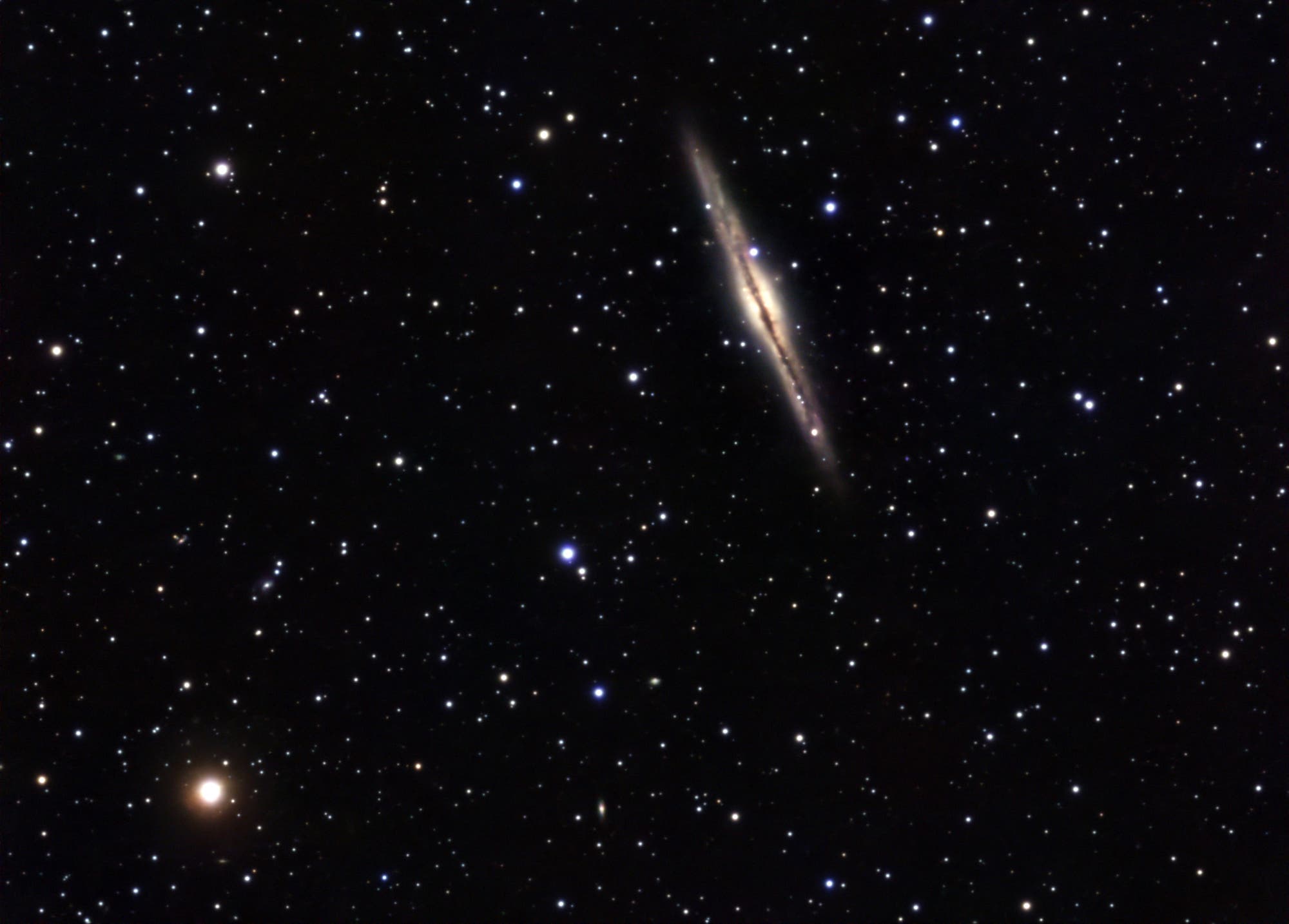 NGC 891 und HD 219749