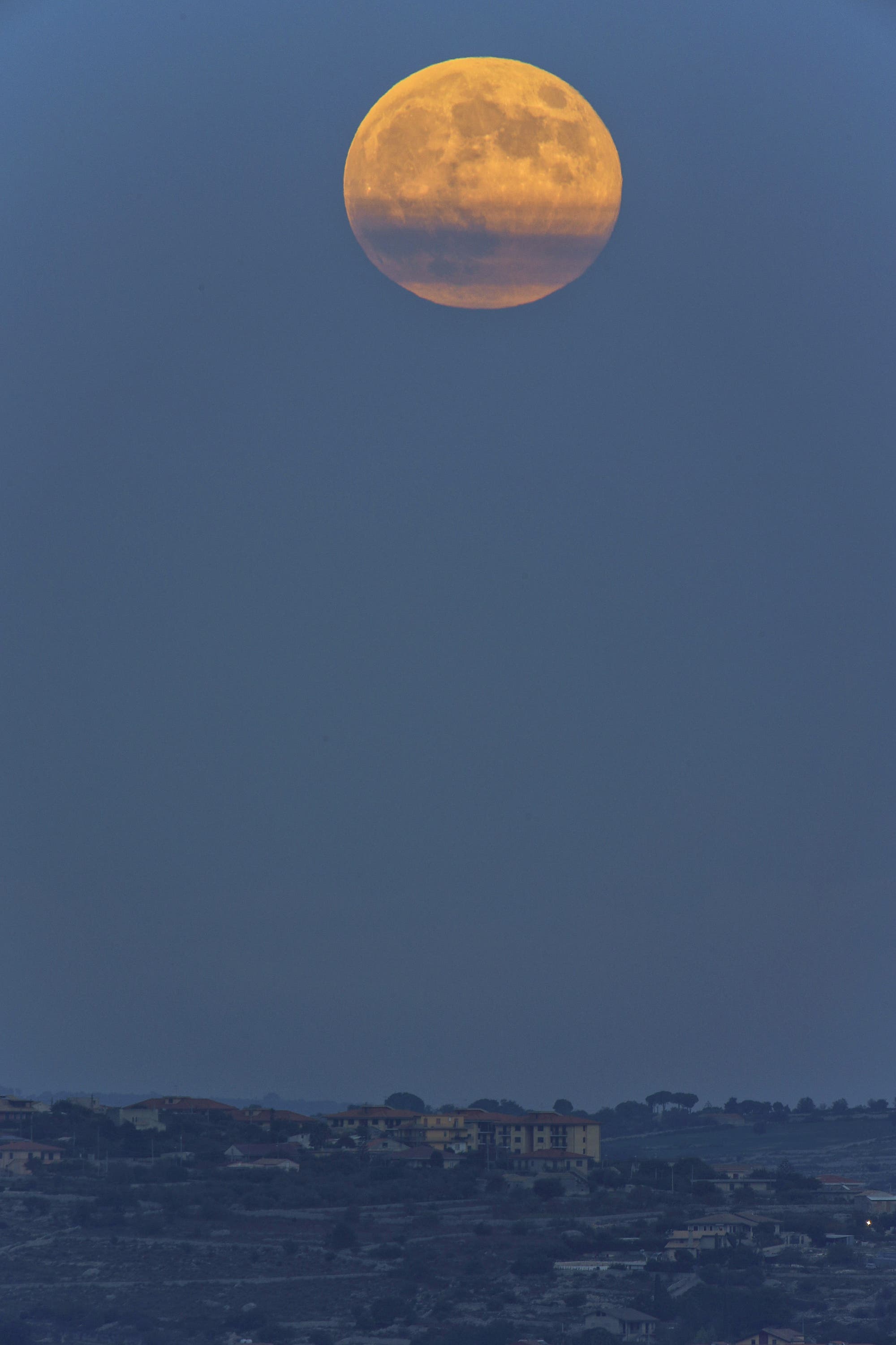 Moon of the deer 100% above Modica - Sicily 