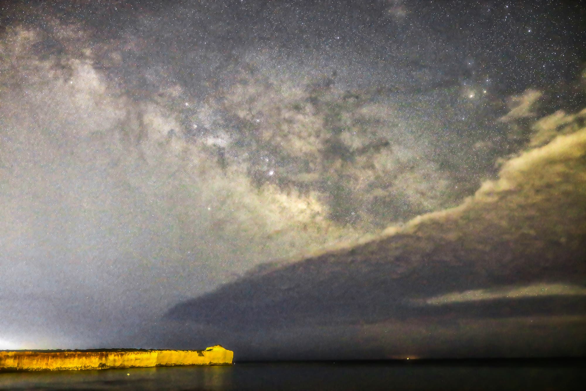 Milky way rises on the coast of porto Ulisse ispica Italy 