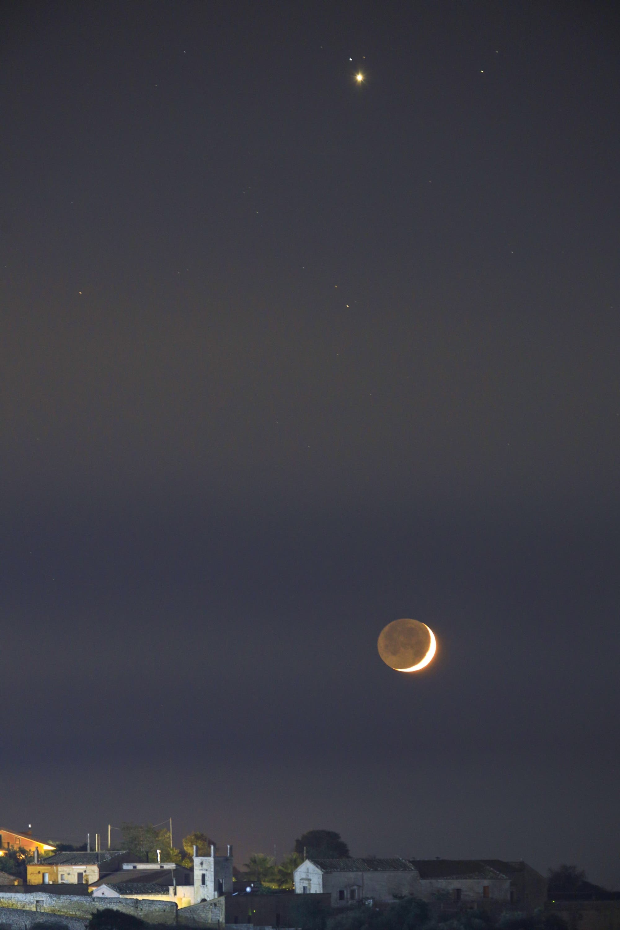 Crescent Moon 9% and Venus over Ragusa - Sicily 