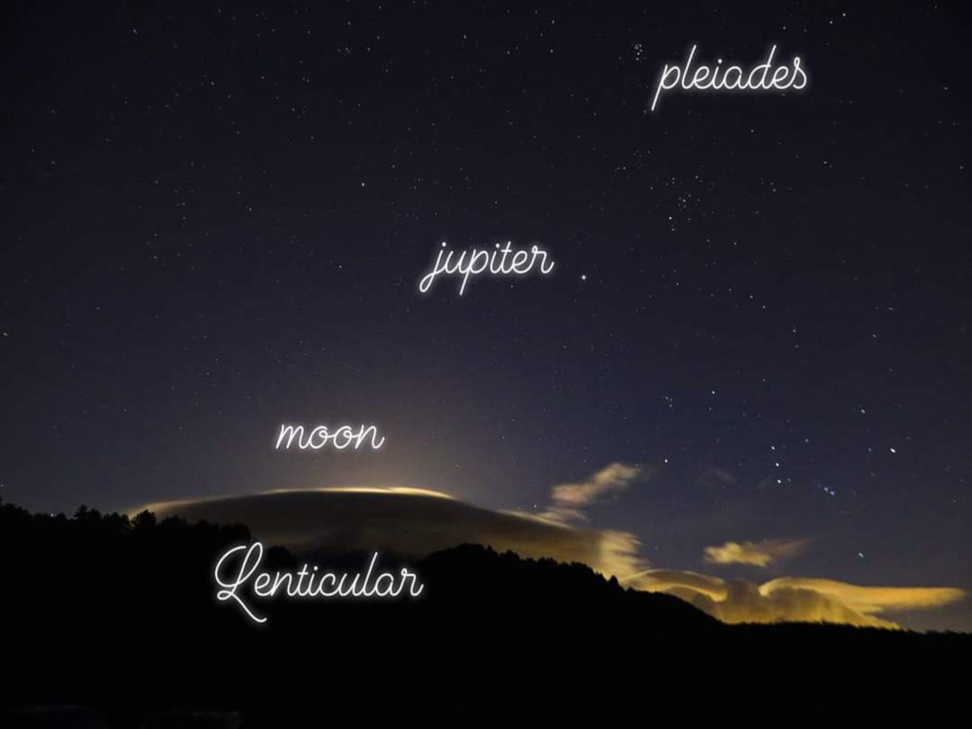 Alignment above Etna volcano, with lenticular clouds Sicily Italy 