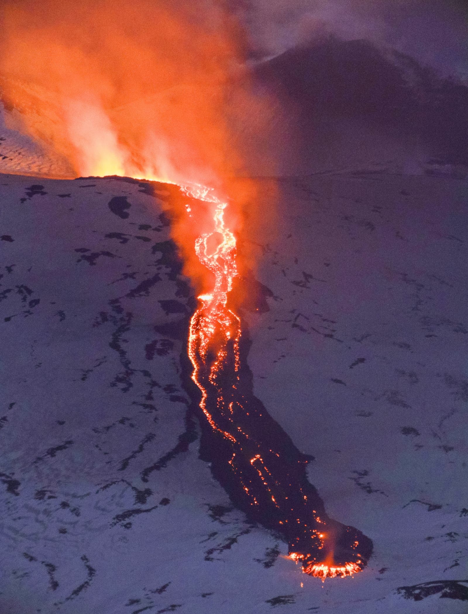 New lava flow eruption from the new mouth of the crater Etna volcano Sicily, Italy 
