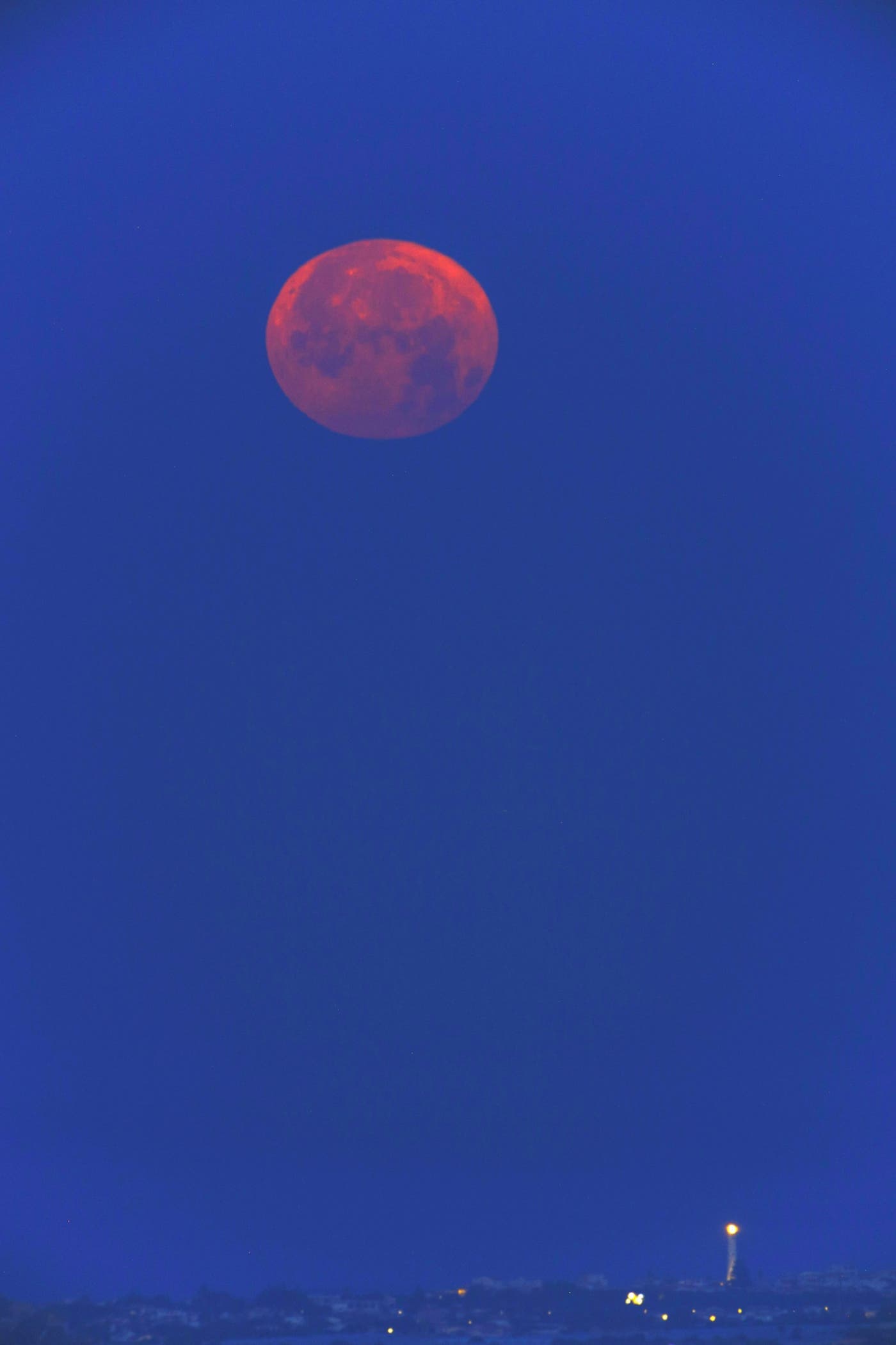 Lunar sunset Punta secca Sicily Italy 