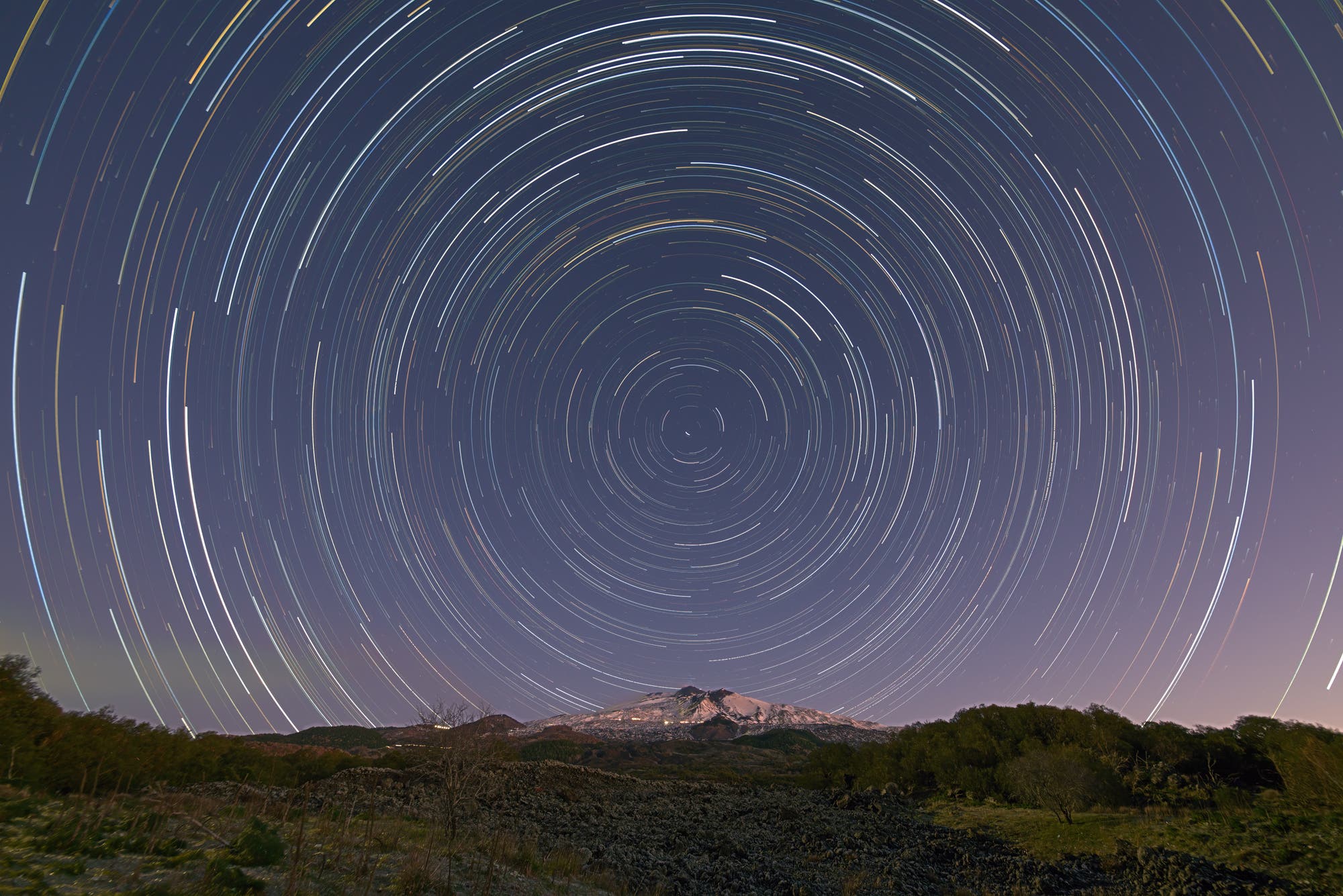 Star trails over Mount Etna