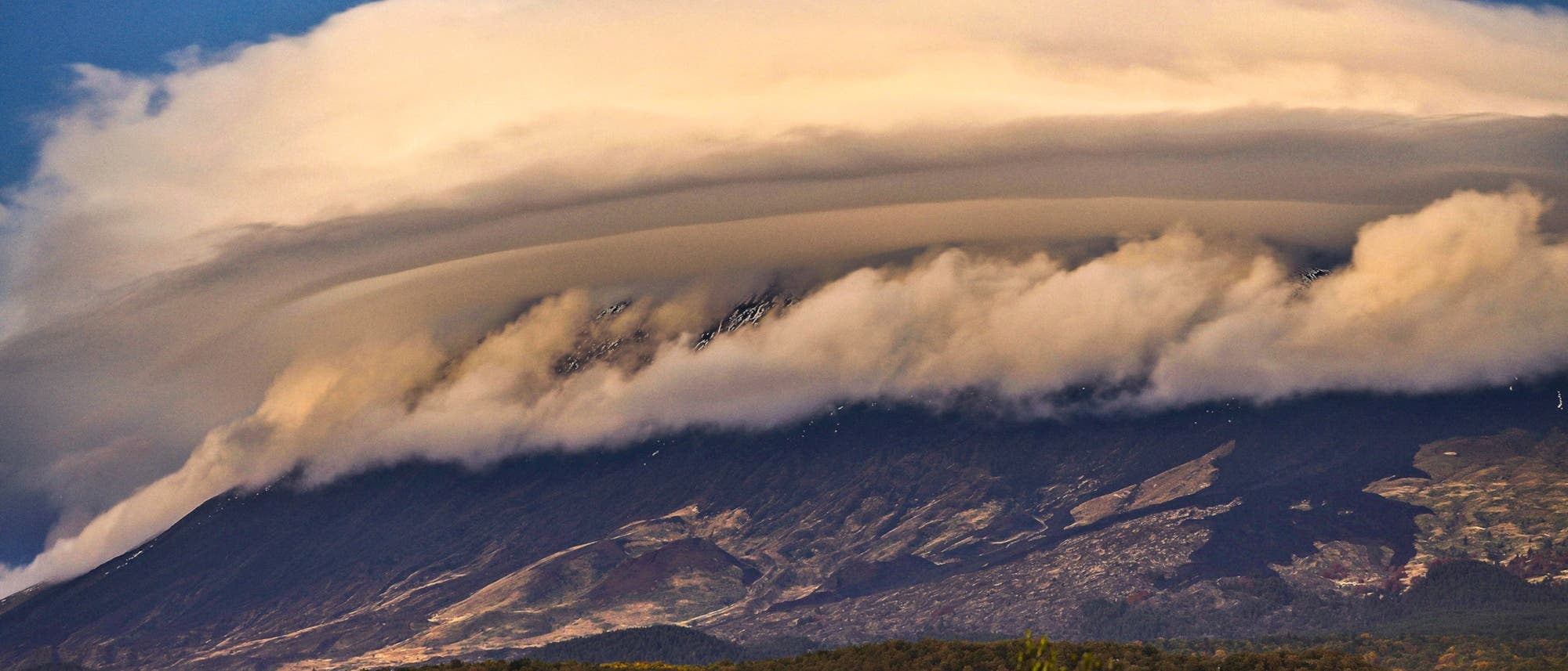 Giant Lenticular clouds above Etna volcano Etna Sicily 