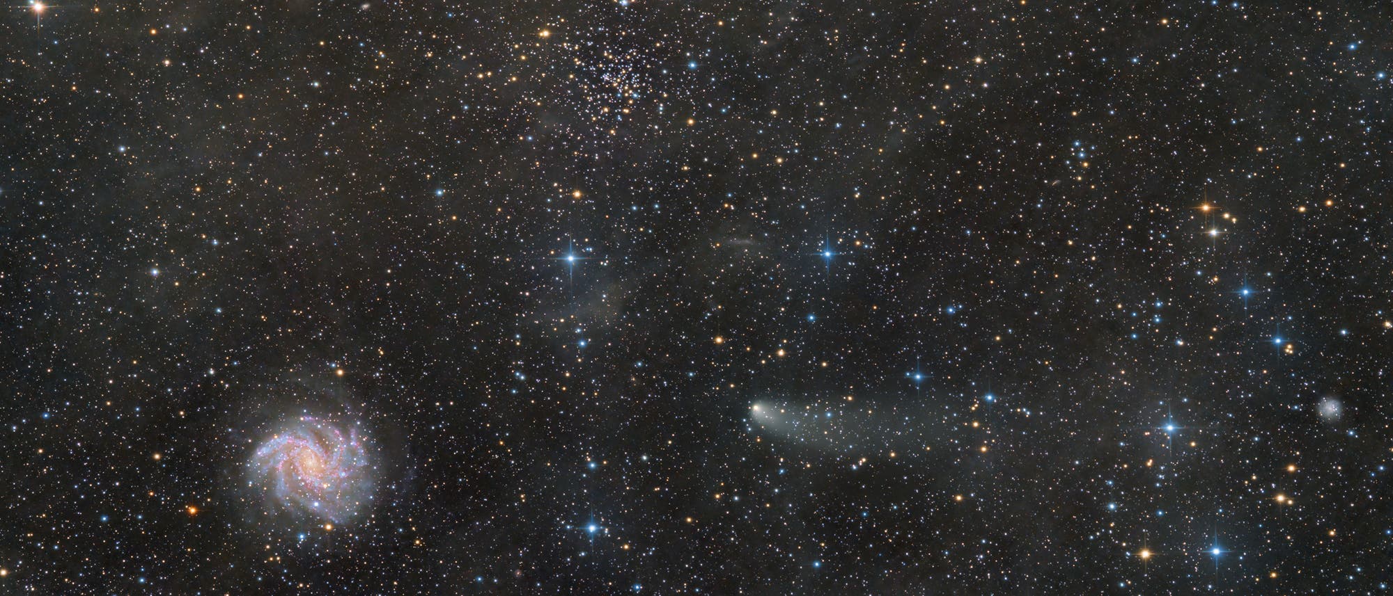 Komet C/2021 S3 (Panstarrs) besucht die Feuerwerksgalaxie