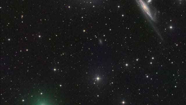 Comet ATLAS and Halley's Coronet galaxy