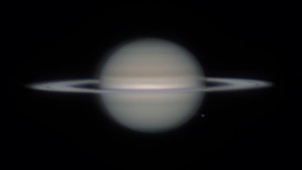 Saturn mit Mond Rhea