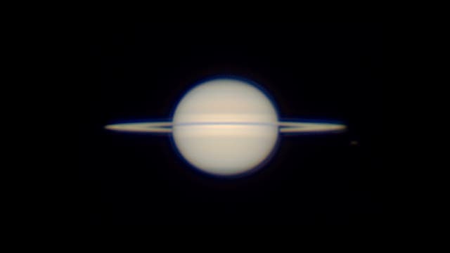 Saturn mit Mond Rhea am 6. September 2025