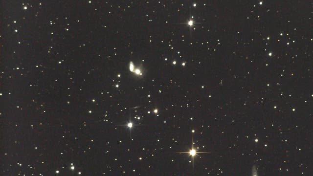 Das wechselwirkende System NGC 5953/5954 in der Schlange (1)