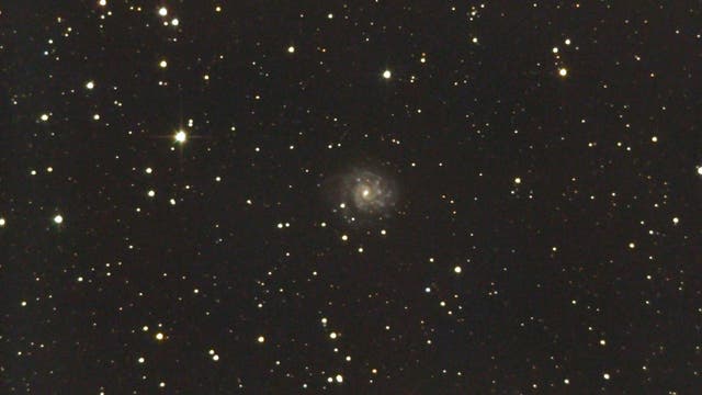 Fath 703 - eine Balkengalaxie im Sternbild Waage