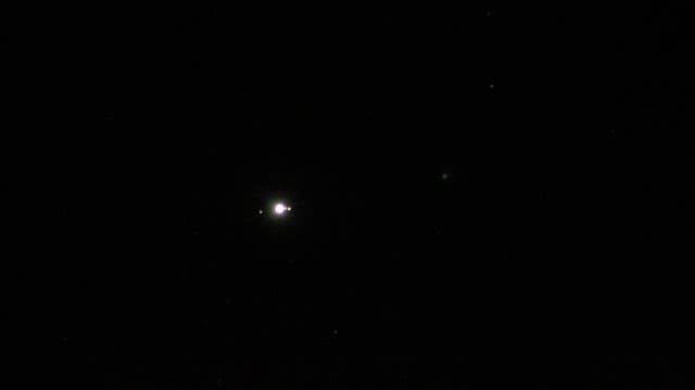 Jupiter und drei seiner Monde