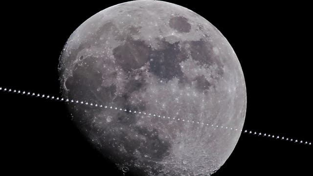 The International Space Station transits the Moon
