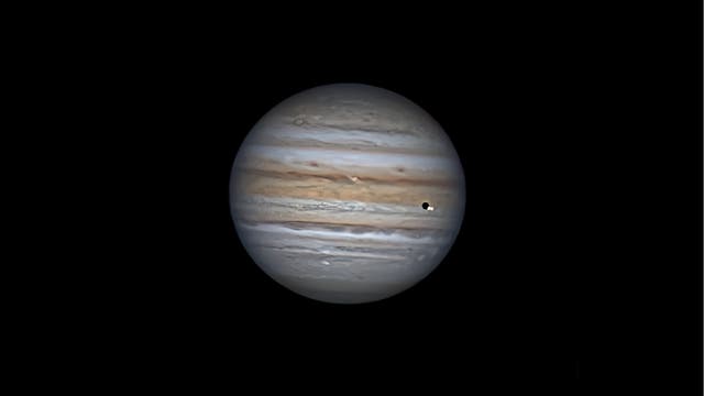 Jupiter mit Io und ihrem Schatten