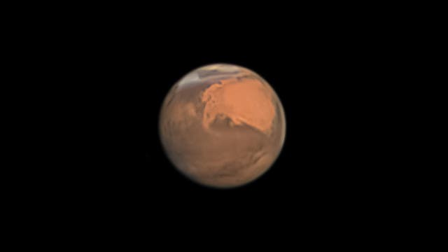 Mars am 21. Dezember 2022 in einer Wolkenlücke