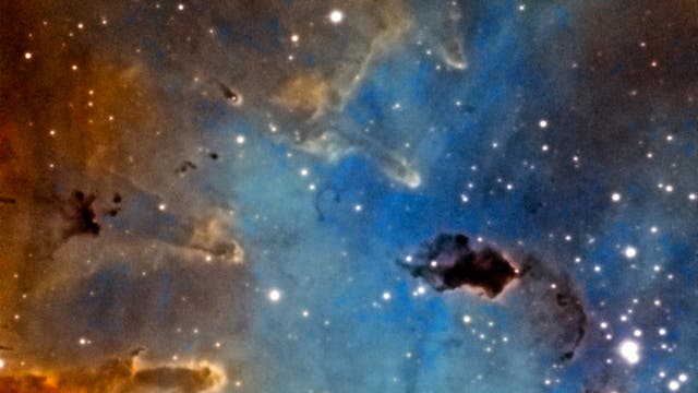 Bok Globule im Pacman-Nebel in SHO Hubble-Palette