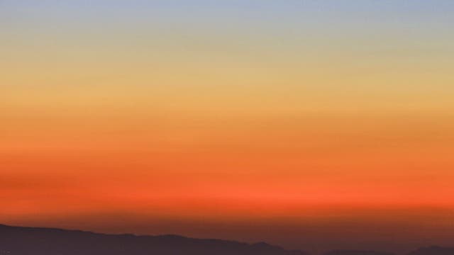 The Moon rising behind the Mountains of Reggio Calabria