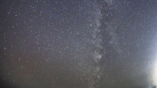 Milky way over the Sea Porto Ulisse Sicily