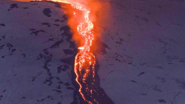 New lava flow eruption from the new mouth of the crater Etna volcano Sicily, Italy 