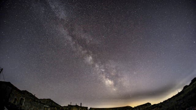 Milky way rises over the countryside, Italy, Ragusa, Sicily 