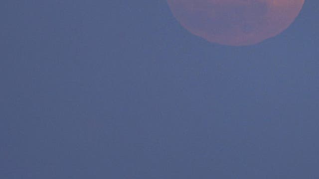 Flower moon rises over the ancient fortress (isola di capo passero Portopalo)