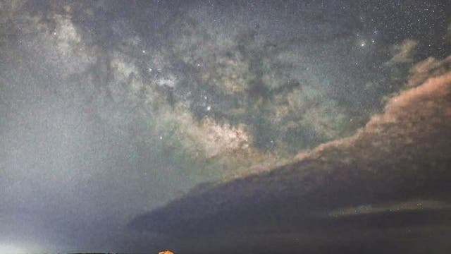Great milky way rising above the coast Porto Ulisse Italy 