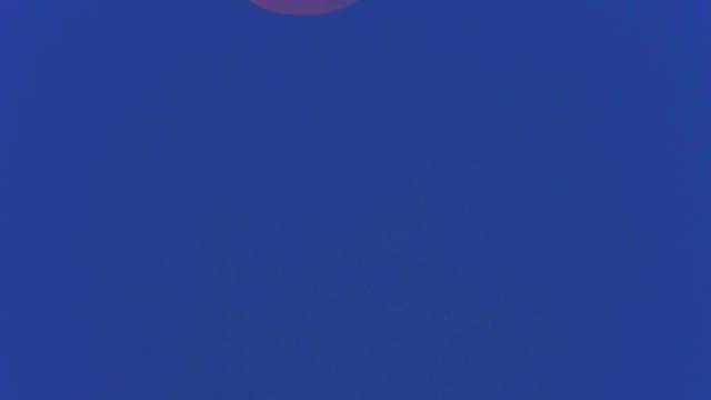 Lunar sunset Punta secca Sicily Italy 