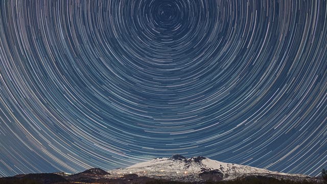 Star trails over Mount Etna