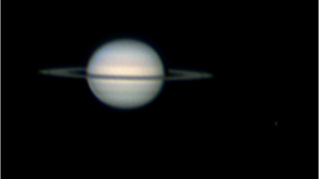 Saturn und sein Mond Titan