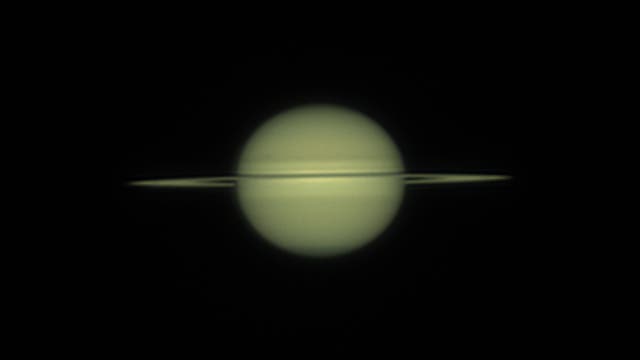 Saturn mit Mondschatten von Rhea