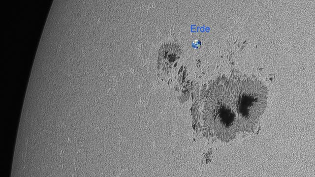 Große Sonnenfleckengruppe Vergleich zur Erde