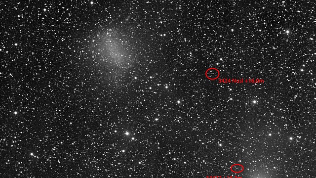 Zwei Kleinplaneten bei NGC 6822 Zwei Kleinplaneten bei NGC 6822