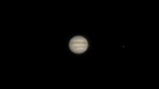Jupiter mit Fleck, Io und Europa Jupiter mit Fleck, Io und Europa