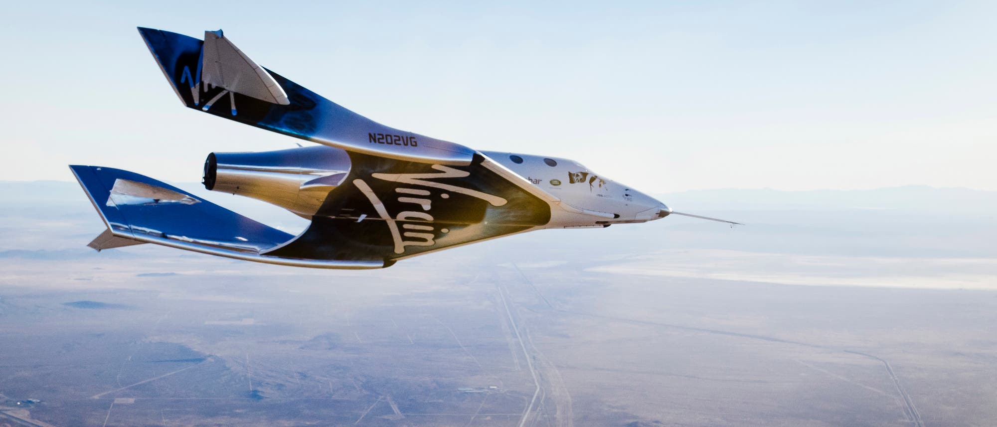Virgin Spaceship Unity (VSS Unity) über der Mojave-Wüste Virgin Spaceship Unity (VSS Unity) über der Mojave-Wüste