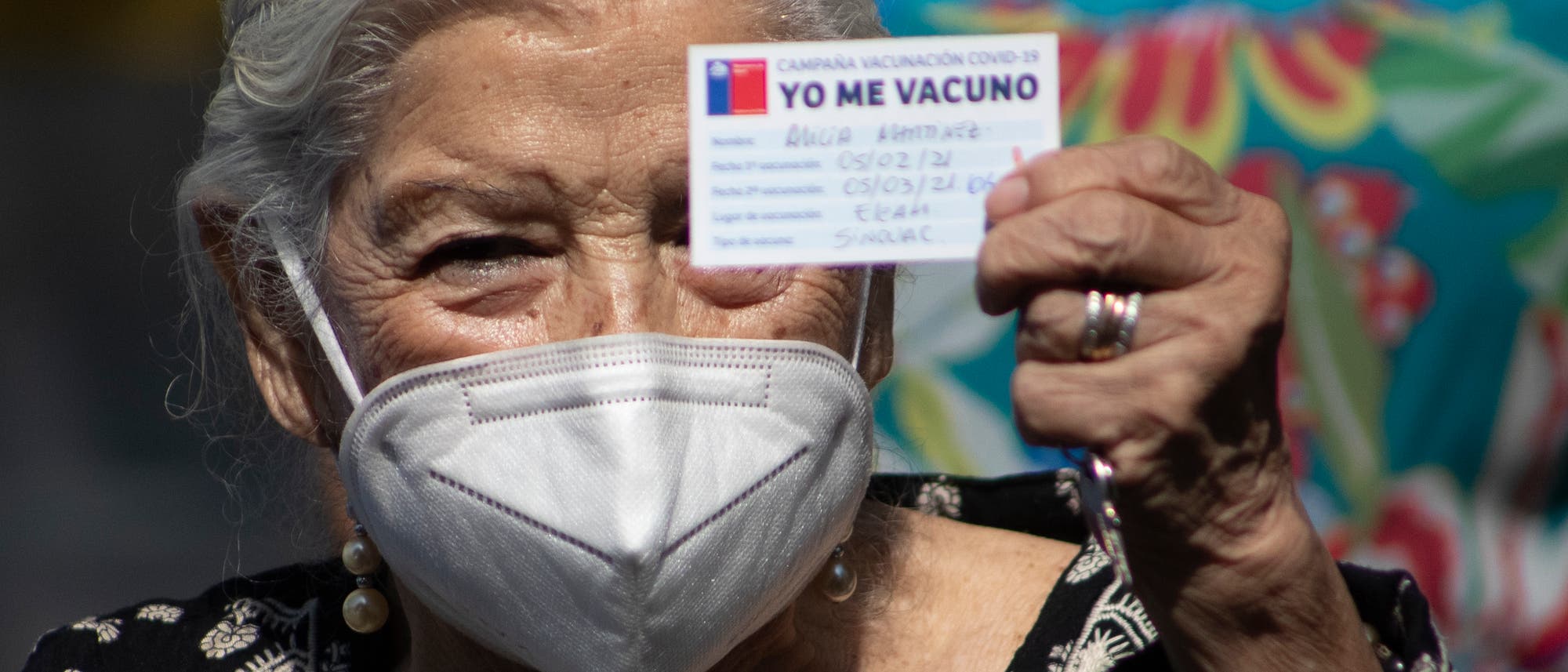 »Ich lasse mich impfen« steht auf dem Impfausweis der chilenischen Impfkampagne