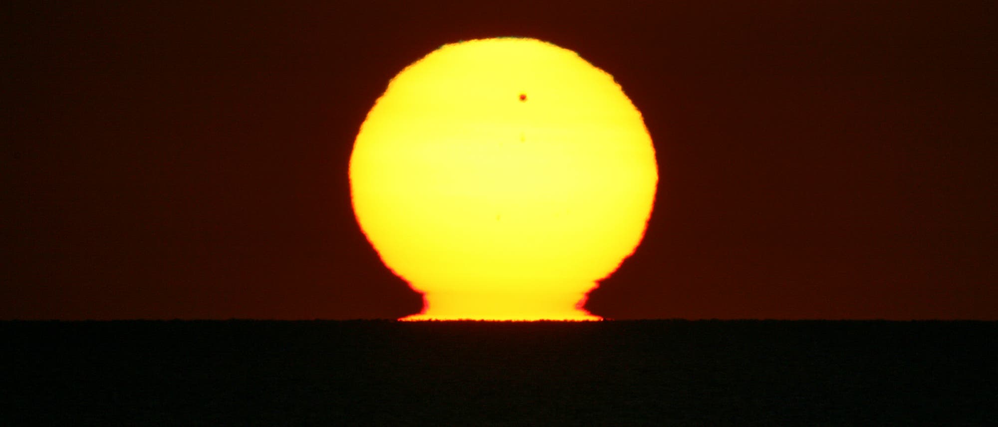 Sonnenaufgang mit Venustransit Sonnenaufgang mit Venustransit
