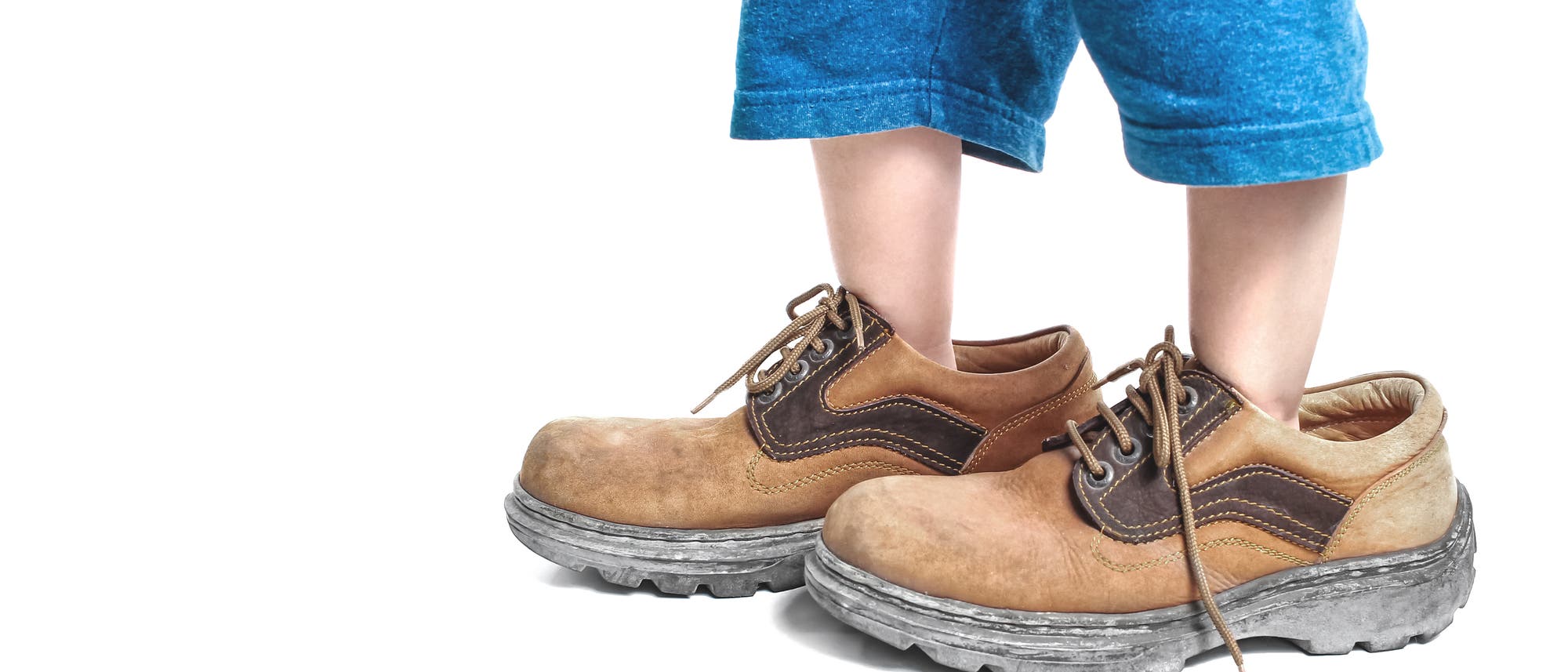 Große-Schuhe-fotolia_90426292_Win Nondakowit Große-Schuhe-fotolia_90426292_Win Nondakowit